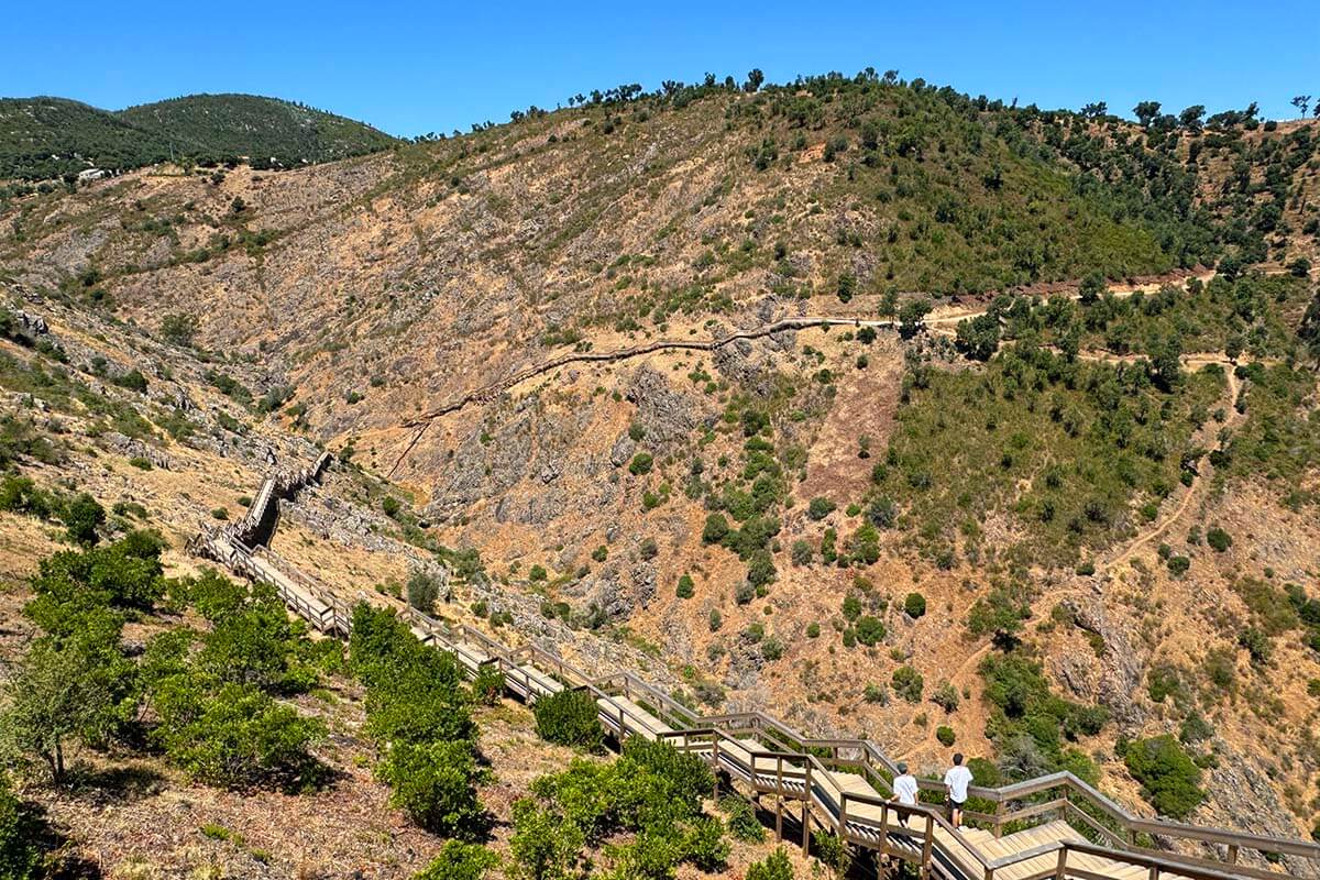 People hiking at Passadiços Barranco do Demo in Alferce Algarve in summer