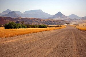 Self-drive Namibia road trip on a gravel road through the mountains