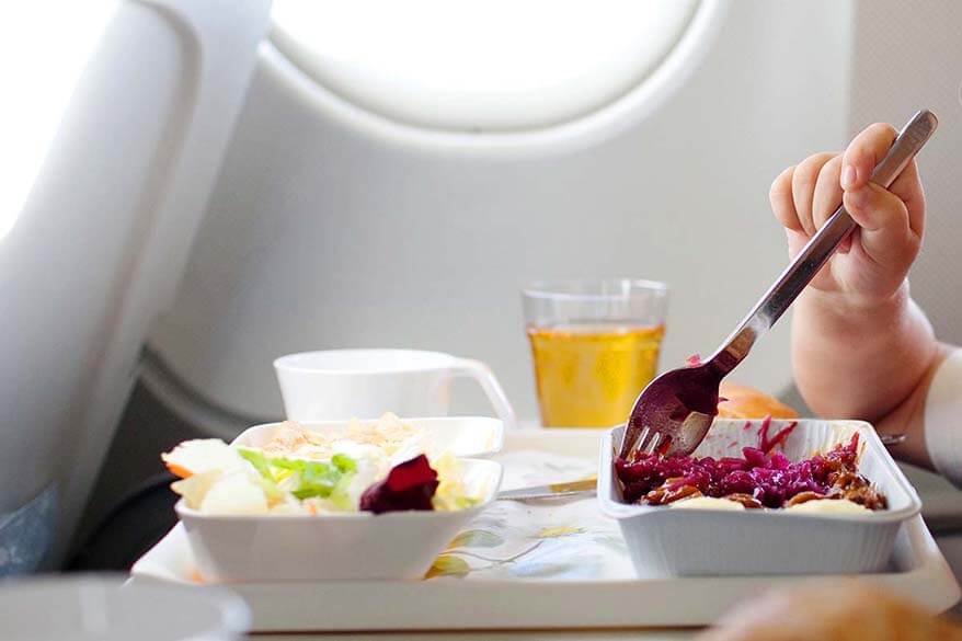 Child eating on an airplane