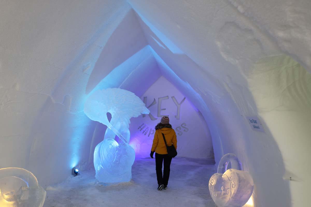 Woman inside an ice hotel near Rovaniemi in Finland in winter